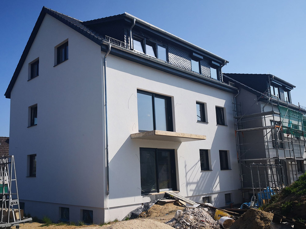 Umbau und Erweiterung der Doppelhaushälfte zum Mehrfamilienhaus in Wolfsburg Hehlingen